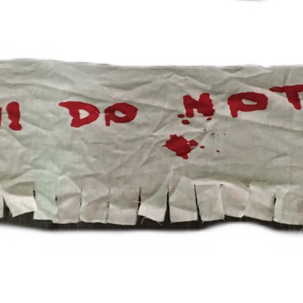 Fringed White and Red Fabric Banner